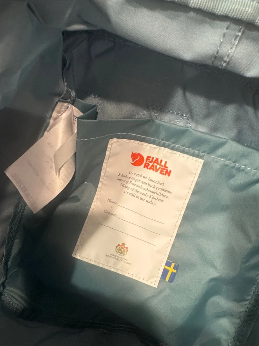 Kipling Mini Backpack in Light Blue with Red Logo